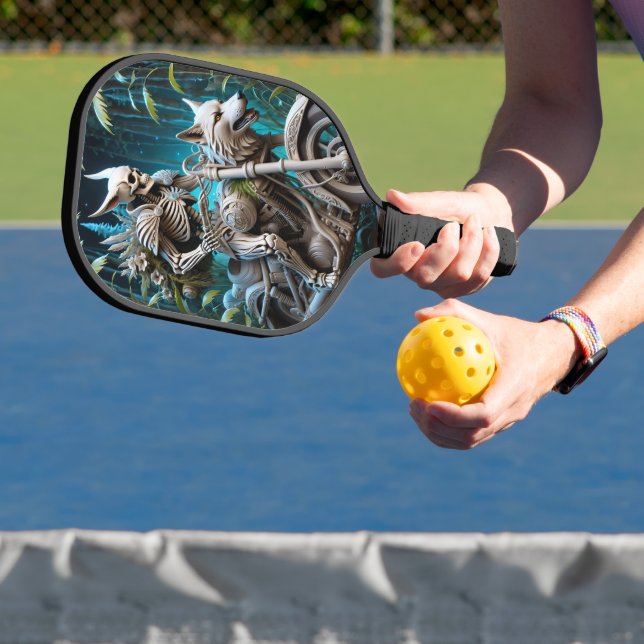 skeleton on a chopper mounted with a wolf head pickleball paddle (Insitu)