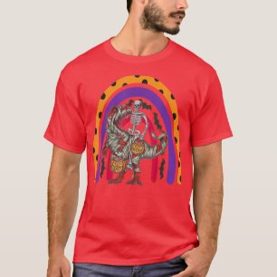 Skeleton riding mummy dinosaur t rex halloween rai T-Shirt