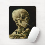 Skeleton with Burning Cigarette | Vincent van Gogh Mouse Mat<br><div class="desc">Skull of a Skeleton with Burning Cigarette (1886) by Vincent van Gogh is a striking and unconventional still-life painting that features a human skull with a lit cigarette between its teeth. The dark background enhances the starkness of the skeletal figure, while the small plume of smoke adds a sense of...</div>