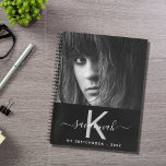 Sketchbook custom photo black white monogram notebook<br><div class="desc">A chic black background. Personalize and add your own photo, a name, monogram letter and a year. The name is written in white with a large modern hand lettered style script with swashes. The monogram letter in gray. For school, work as a sketchbook, diary and journaling. To keep the swashes...</div>