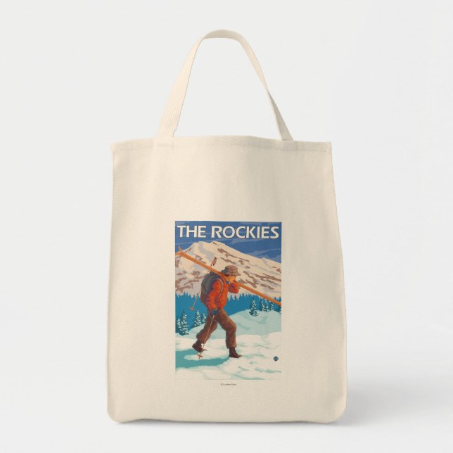 Skier Carrying Snow Skis - The Rockies Tote Bag (Front)