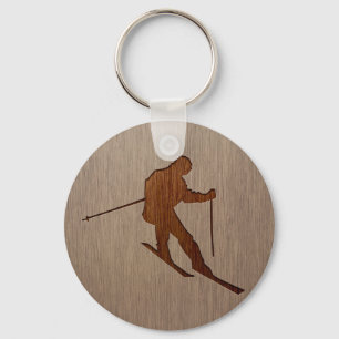 Skiing silhouette engraved on wood design key ring
