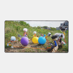 Skippie ball race by Fubby dolls on balloons. Desk Mat