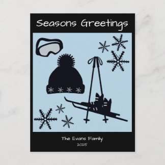 Skis, hat, goggles & snowflakes holiday postcard