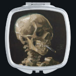 Skull with Burning Cigarette Vincent van Gogh Art Mirror For Makeup<br><div class="desc">Vincent van Gogh (Dutch, 1853 - 1890) Skull of a Skeleton with Burning Cigarette, 1885–86, Oil on canvas Unframed: 32 cm × 24.5 cm (13 in × 9.6 in) Early work by Vincent van Gogh. This small painting is part of the permanent collection of the Van Gogh Museum in Amsterdam....</div>