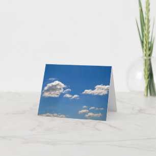 Sky is blue and white clouds are passing by card