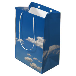 Sky is blue and white clouds are passing by medium gift bag