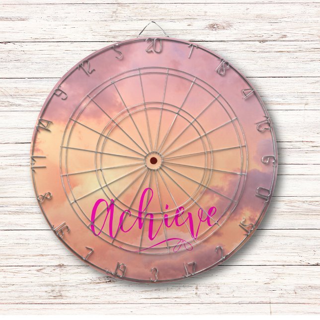 Sky Photo Pink Achieve Modern Script Typography Dartboard (Pink sky and purple clouds dart board, with hot pink inspirational quote, achieve on a white wall.)