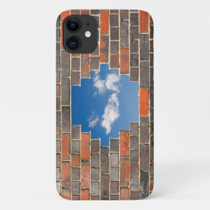 Sky through a hole in a brick wall iPhone 11 case