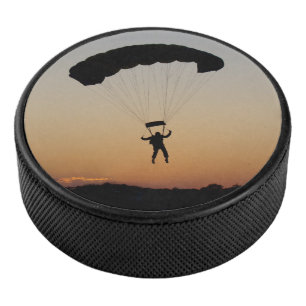 Skydiver Parachute at Sunset Hockey Puck