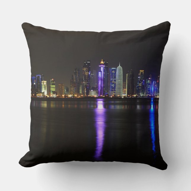 Skyline of Doha, Qatar at night throw pillow (Front)