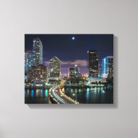Skyline of Miami city with bridge at night