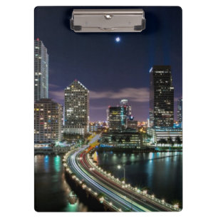 Skyline of Miami city with bridge at night Clipboard