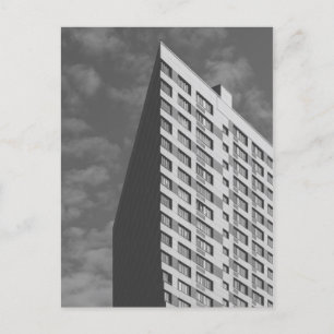 Skyscraper on the sky background postcard