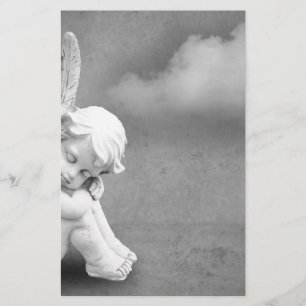 Sleeping angel on grey background, angelic art stationery