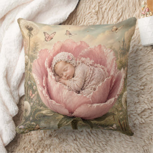 Sleeping baby in pink flower  cushion