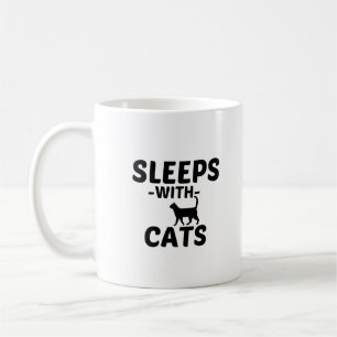 SLEEPS WITH CATS COFFEE MUG