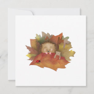 Sleepy hedgehog in a bed of autumn leaves card