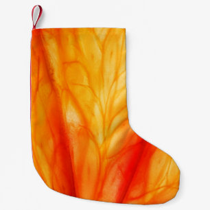 Slice of citrus fruit with backlit, abstract macro small christmas stocking