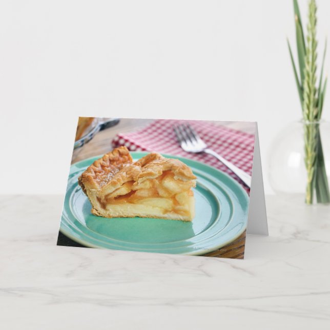 Slice of fresh baked apple pie on plate card (Front)