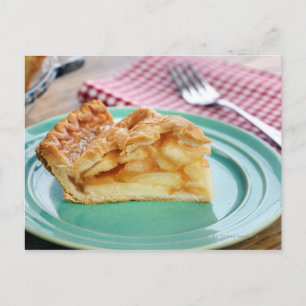 Slice of fresh baked apple pie on plate postcard