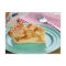 Slice of fresh baked apple pie on plate