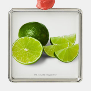 Sliced lime wedge, on white background, cut out metal tree decoration