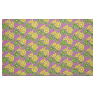 Sliced , quartered lemons and limes purple fabric