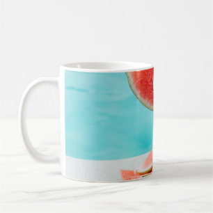 Sliced watermelon on white paper coffee mug