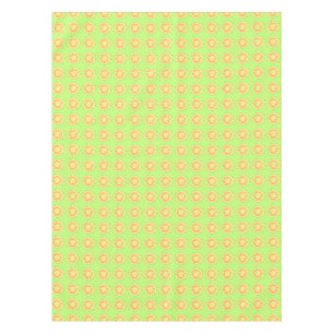Sliced yellow pineapples on green table cloth
