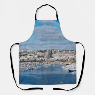 Sliema harbour with modern buildings and boats apron