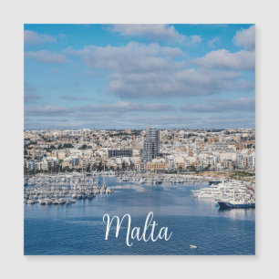 Sliema harbour with modern buildings and boats mag