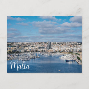 Sliema harbour with modern buildings and boats postcard