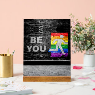 SlipperyJoe's Be You black brick wall walking figu Acrylic Sign