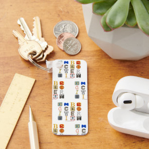 SlipperyJoe's embrace diversity cut-out letters co Key Ring