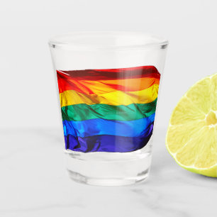 SlipperyJoe's gay pride flag waving pride colours  Shot Glass