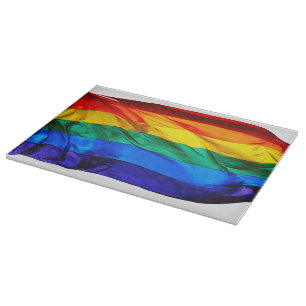 SlipperyJoe's gay pride flag waving red orange yel Cutting Board