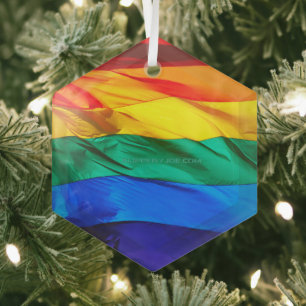 SlipperyJoe's gay pride flag waving red orange yel Glass Tree Decoration