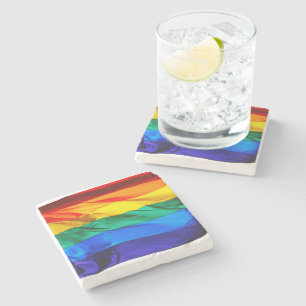 SlipperyJoe's gay pride flag waving red orange yel Stone Coaster