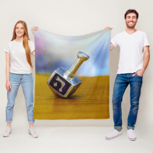 SlipperyJoe's Happy Hanukkah four-sided spinning t Fleece Blanket
