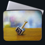 SlipperyJoe's Happy Hanukkah four-sided spinning t Laptop Sleeve<br><div class="desc">SlipperyJoe's Happy Hanukkah four-sided spinning top dreidel artistic Celebration Candles Jewish Hebrew Chanukah gifts decorations Judaism religion Hebrew letter Nun traditional toy children adult game cultural symbol metallic shiny finish wooden surface</div>