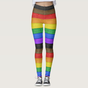 SlipperyJoe's inclusive gay pride flag wooden blac Leggings
