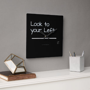 SlipperyJoe's look left funny stark white arrow pl Square Wall Clock