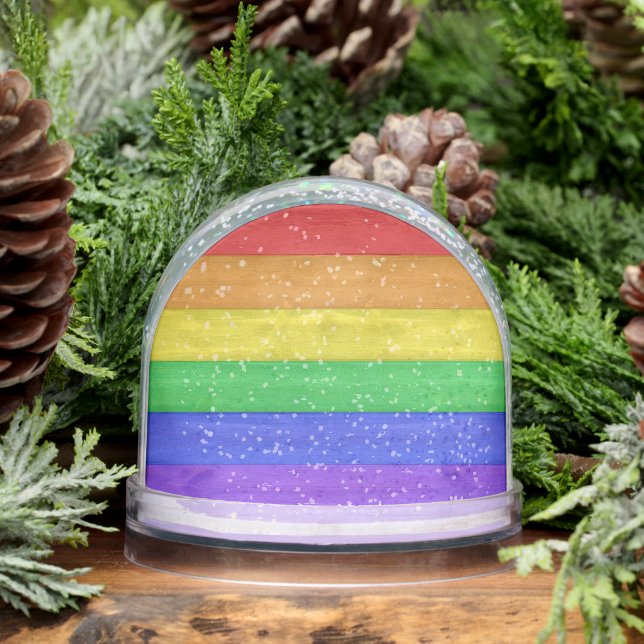 SlipperyJoe's pride wooden flag horizontal rainbow Snowglobe (Winter)