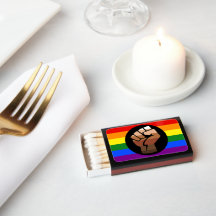 SlipperyJoe's queer people colour flag raised fist