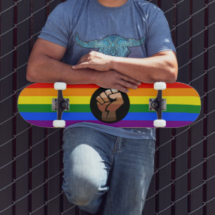 SlipperyJoe's queer people colour flag raised fist Skateboard