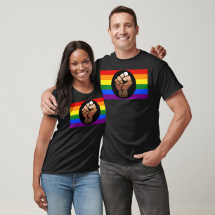 SlipperyJoe's queer people colour flag raised fist T-Shirt