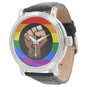 SlipperyJoe's queer people colour flag raised fist Watch
