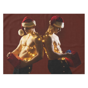 SlipperyJoe's shirtless men back-to-back Christmas Tablecloth