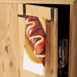 SlipperyJoe's summer BBQ vibe hot dog nestled soft Tea Towel